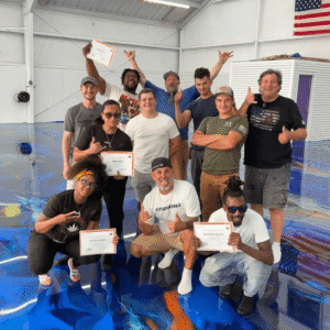 Students participating in epoxy flooring class at London Epoxy Academy